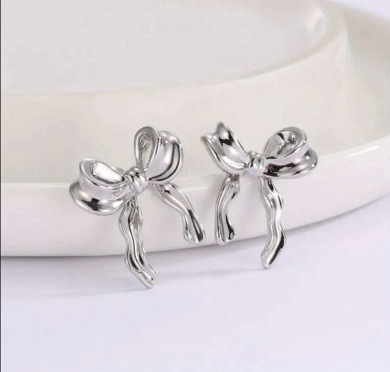 Aretes silver bow
