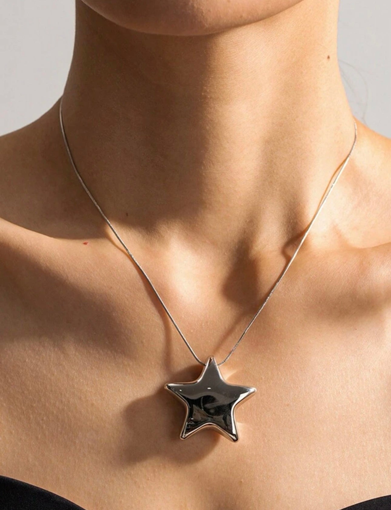 Collar estrella globo