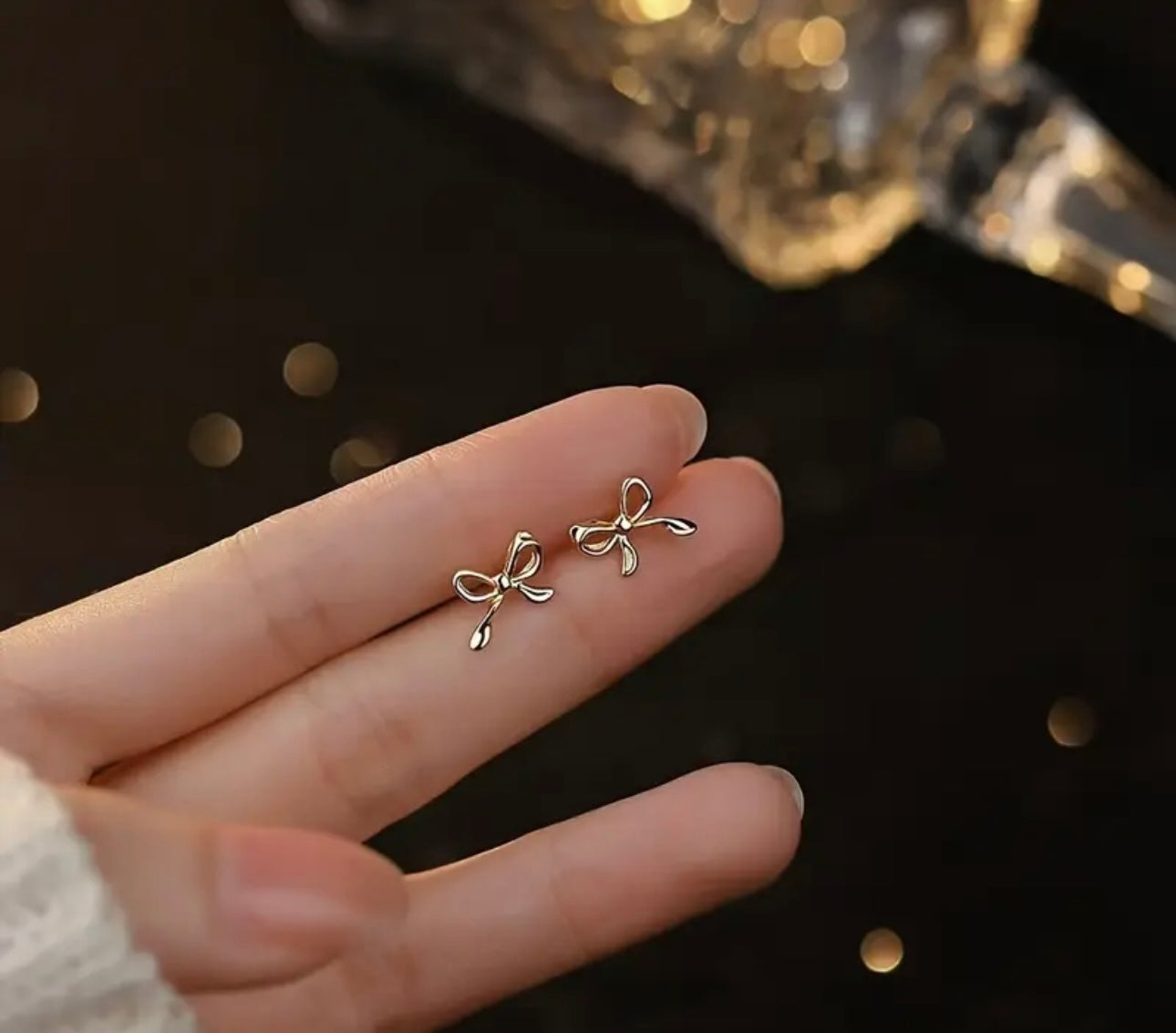 Aretes mini bow plateados