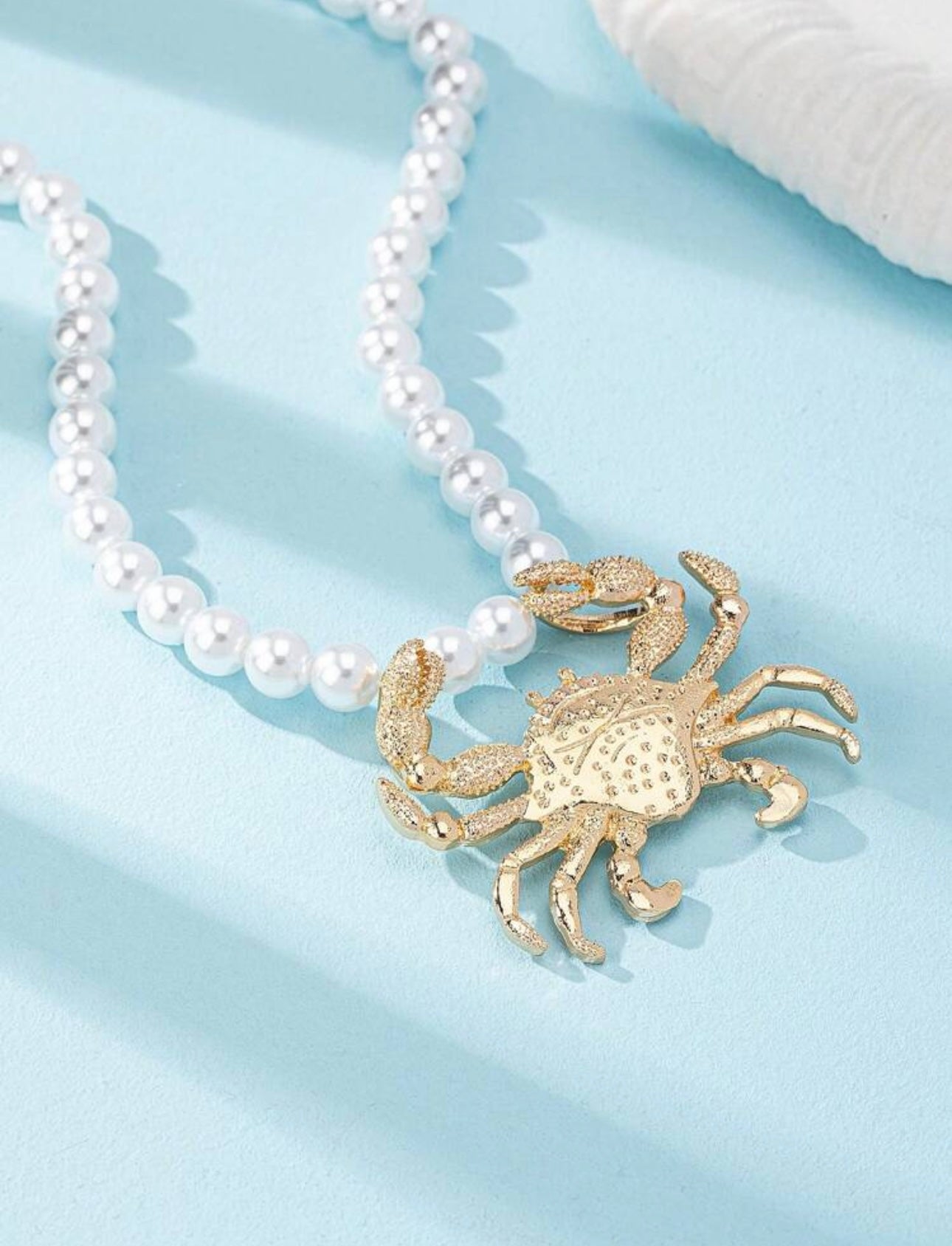 Collar cangrejo dorado