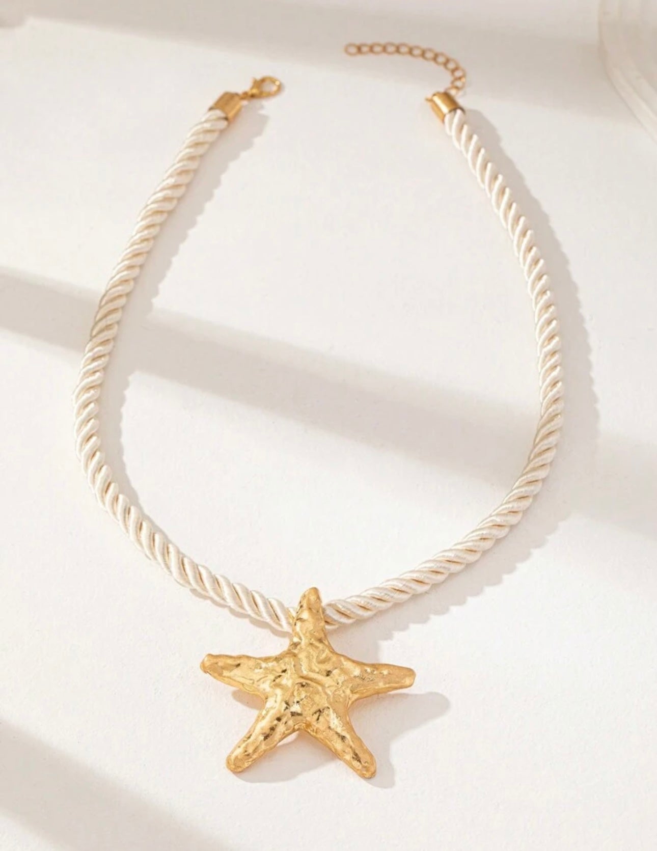 Collar estrella dorada