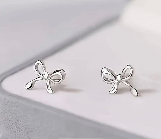 Aretes mini bow plateados
