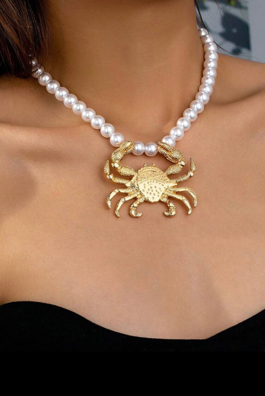 Collar cangrejo dorado