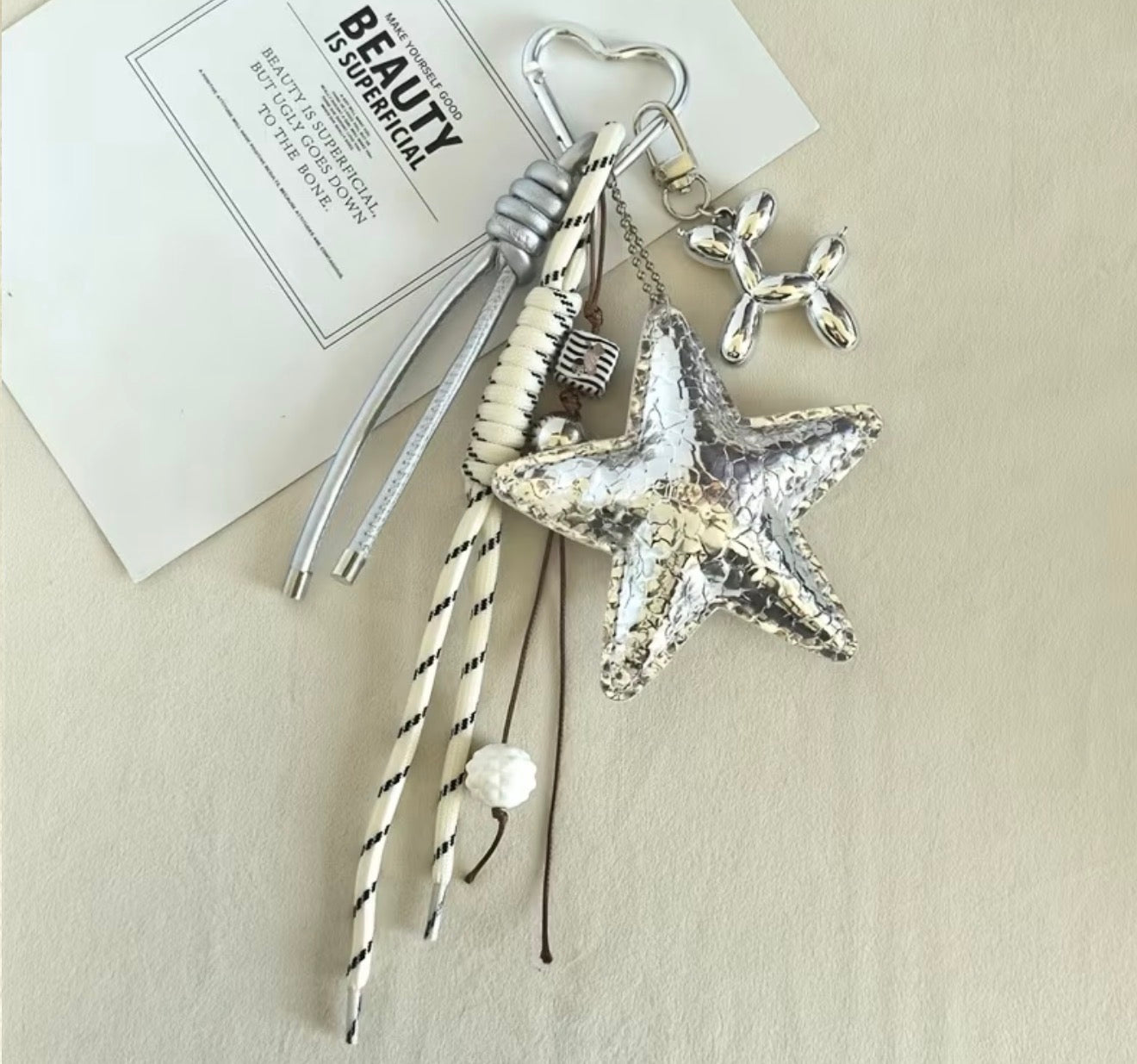 Llavero estrella plata