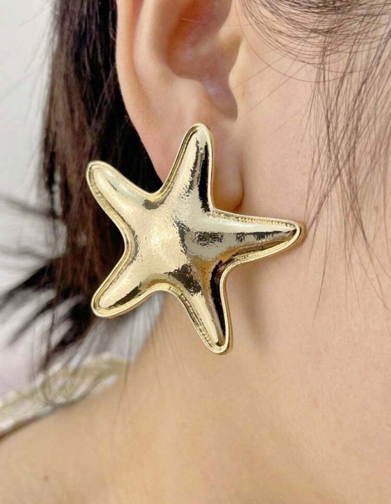 Aretes estrella de mar dorados