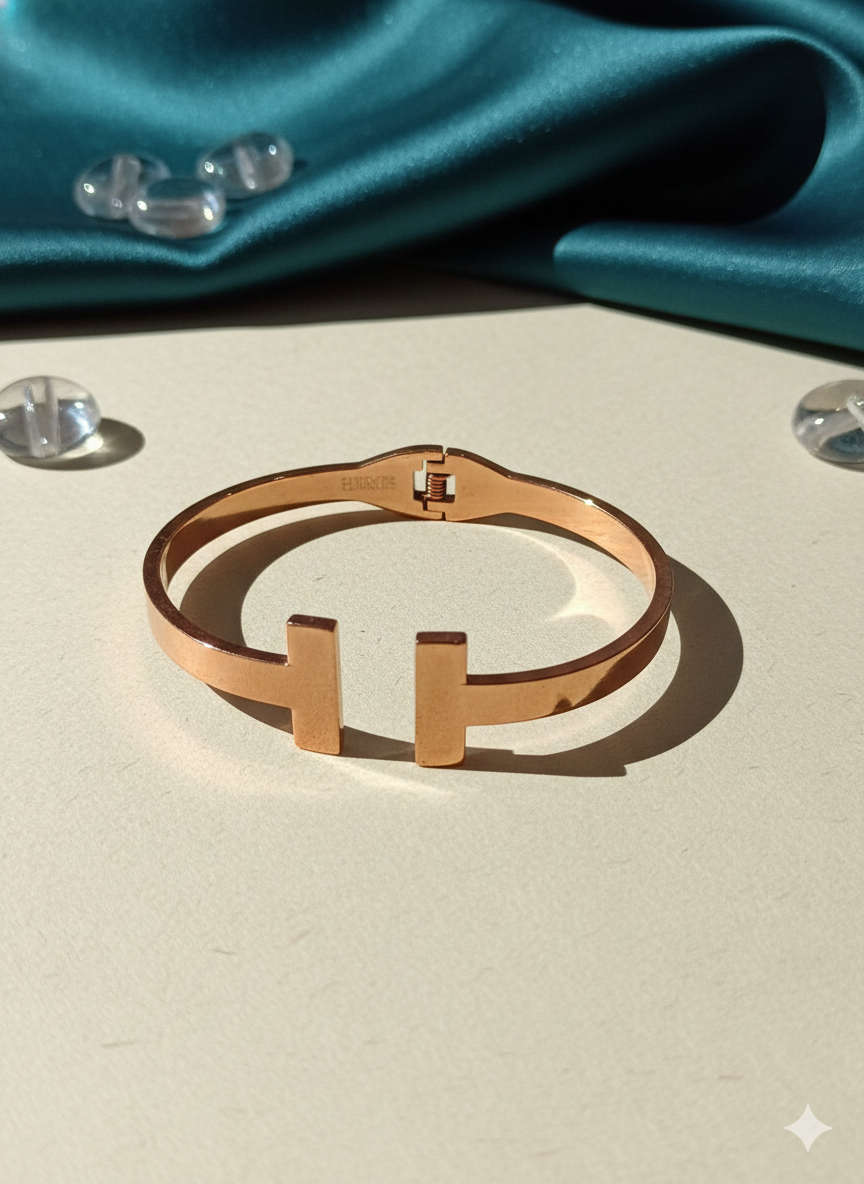 Brazalete rígido doble "T"