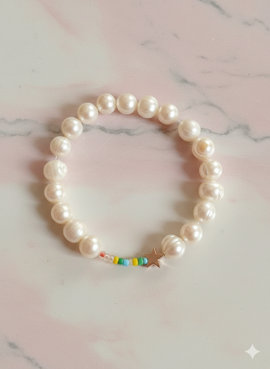 Pulsera perlas una estrella y colores