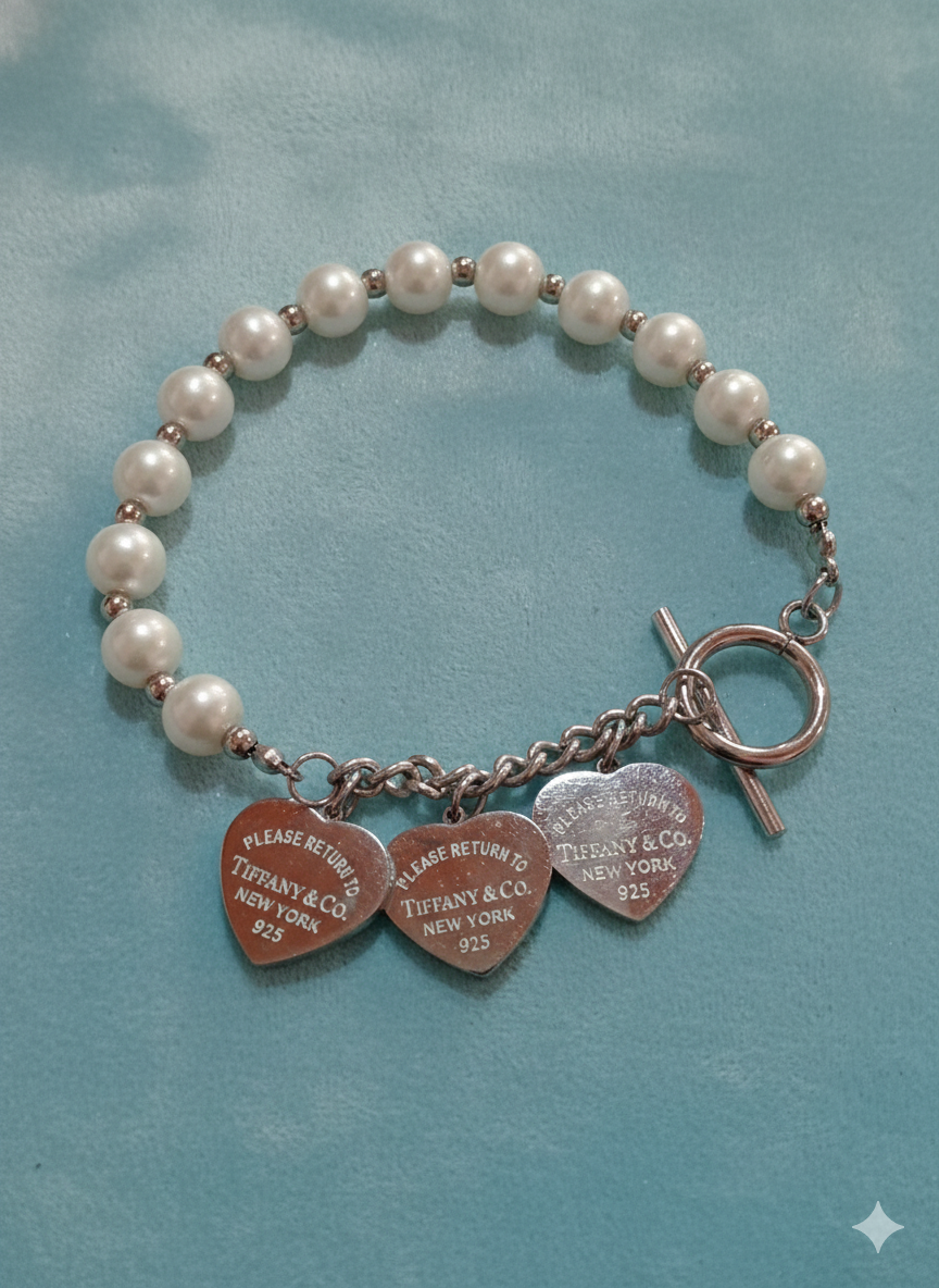 Pulsera Tiffany tres corazónes