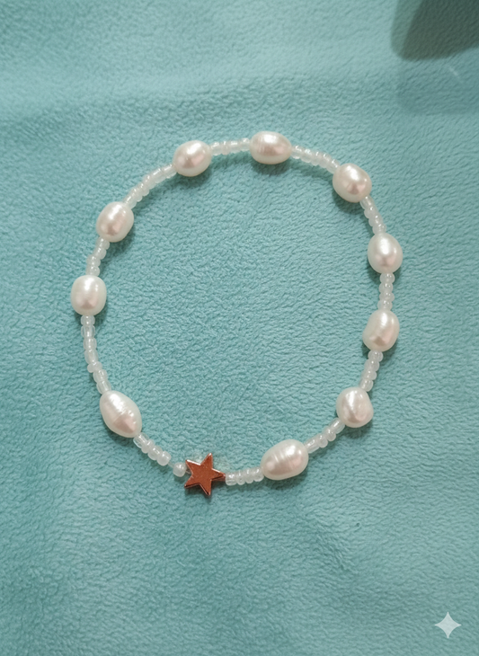 Pulsera de perlas con estrella