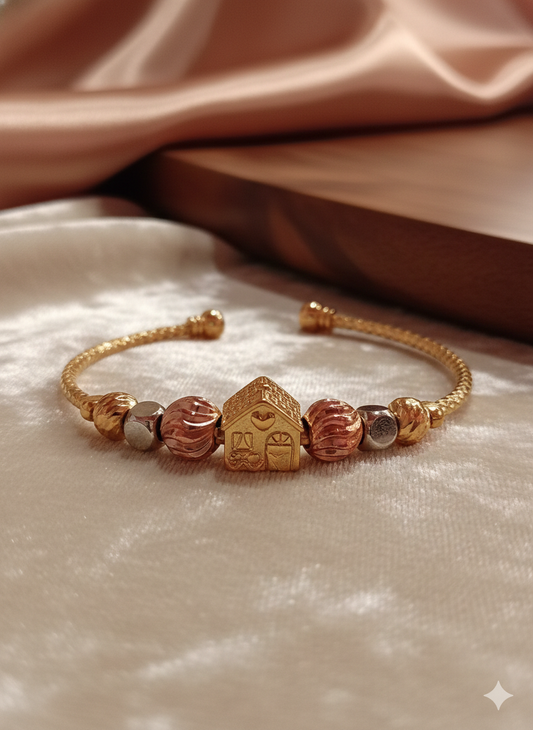 Pulsera casita dorada